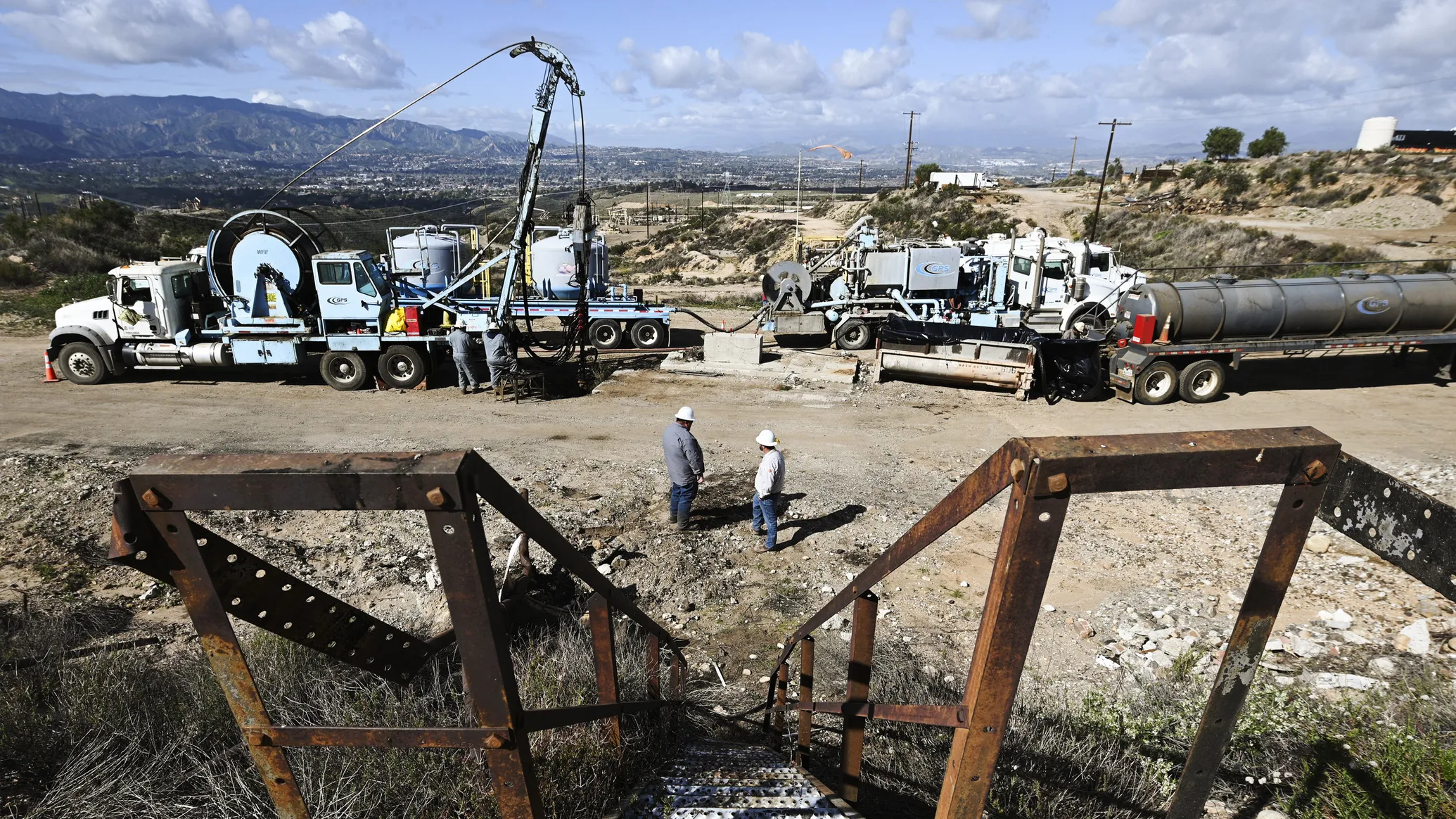 A crew plugs abandoned oil wells at the Placerita Oil Field in Southern California. Abandoned oil and gas wells could be used to generate geothermal energy.