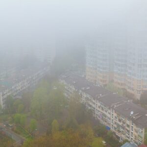 Apartment buildings seen through smog