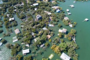 Historic Flooding in Central Texas Homes under water at Graveyard Point neighborhood community in the flood plain of Lake Travis - near Austin, Texas