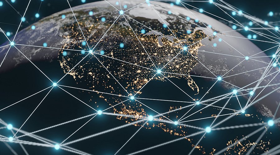 Nighttime view of the Earth, centered on the US, shown behind a network diagram