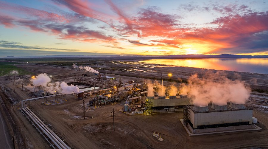 Steam rising above an industrial geothermal power plant, California’s Salton Sea in the distance (iStock)