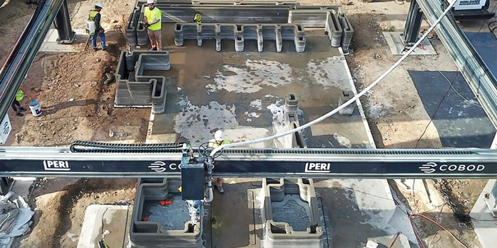 A construction 3D printer gantry is helping to build a Houston home that will be the first multistory 3D-printed structure in the U.S., also incorporating wood framing in a new hybrid design. (Lok/Zivkovic)