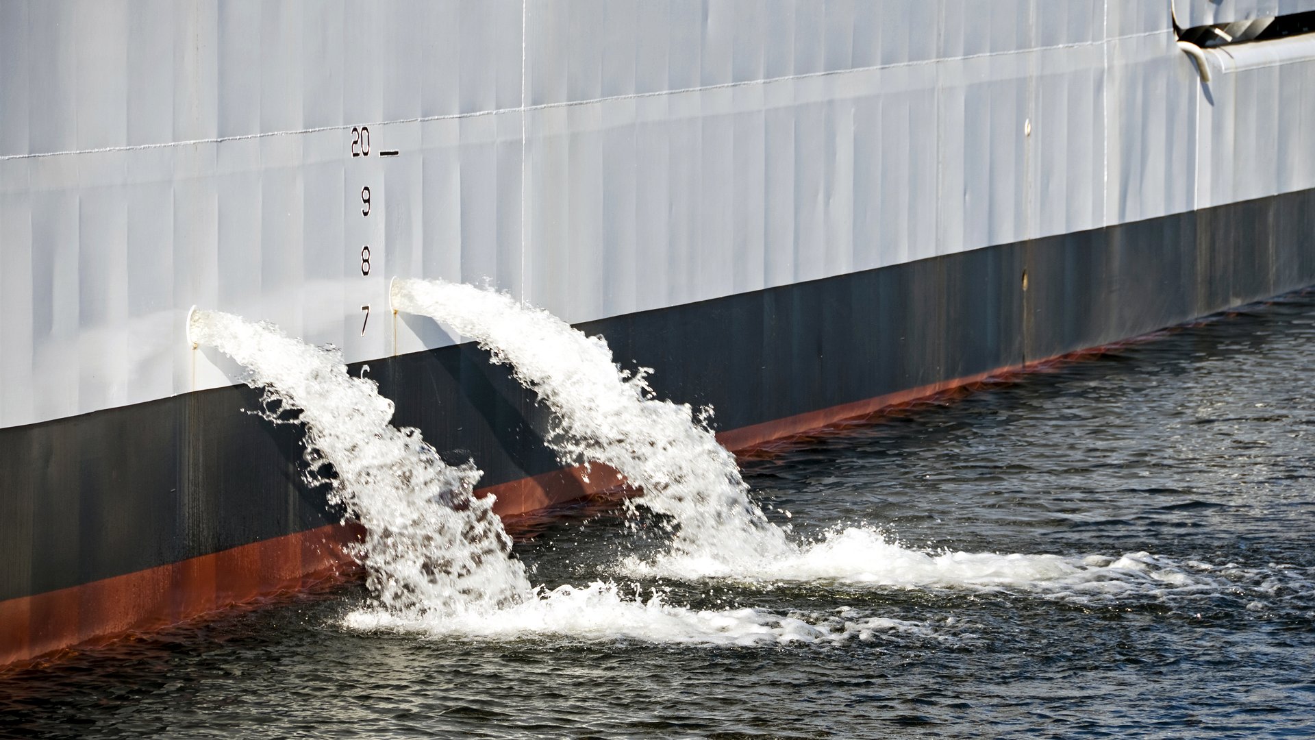 Ballast water pouring from ship (iStock)