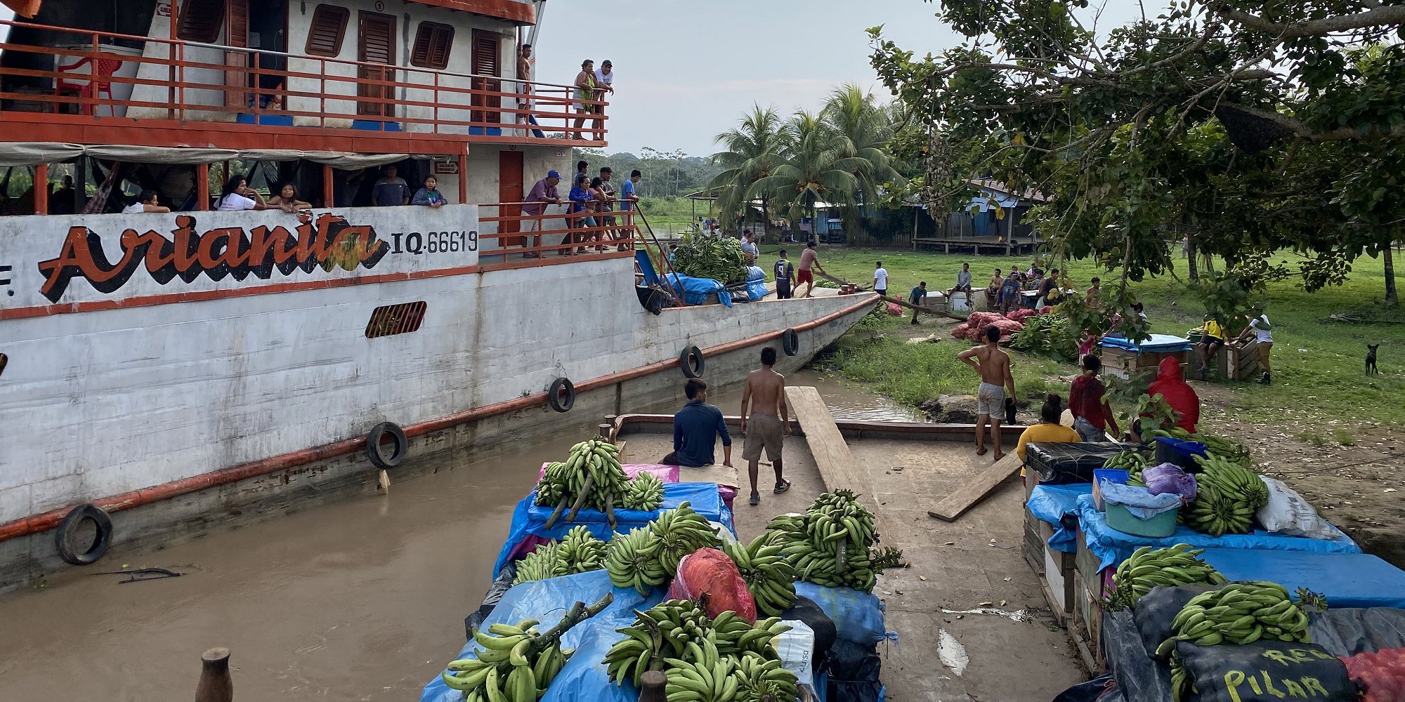 Cargo ships docked at San Juan on the Ucayali River, Peru. (Credit: Kara Fikrig)