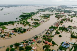 Water covers residential areas and roads due to heavy rainfall from a major storm in Thailand. (iStock)